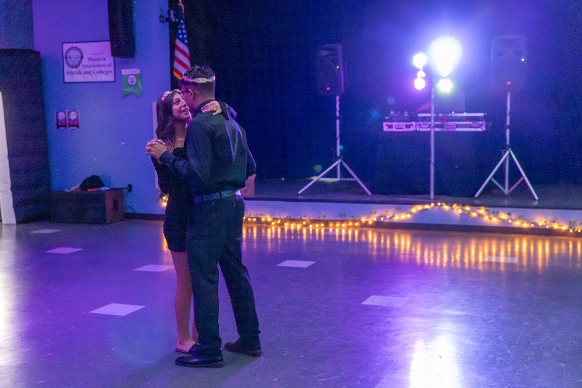 Seniors Britney Aispuro ('25) (left) and Ben Aviles ('25) (right) dance after winning the titles of Homecoming 2024's king and queen. (Photo credit: Ellis Evans)