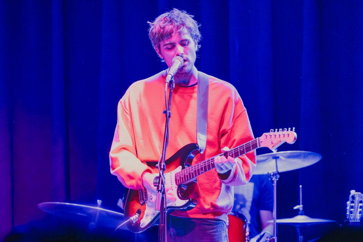 Joseph Stephens, frontman of Peel Dream Magazine, plays guitar and sings while he performs at The Constellation Room in Santa Ana, California on Sunday, Nov. 24, 2024. (Photo credit: Ellis Evans)