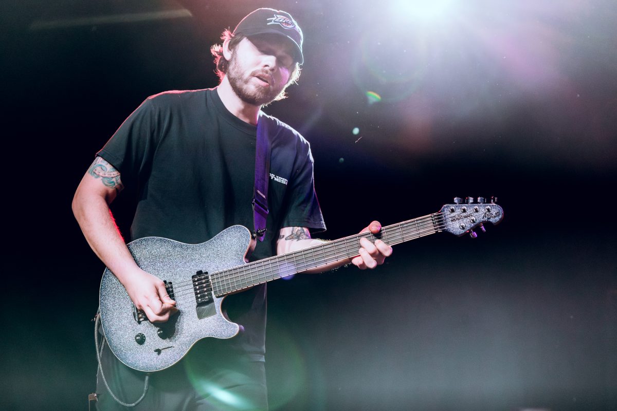 Chat Pile guitarist Luther Manhole plays at Chat Pile's show at The Glass House in Pomona, CA on Feb. 22, 2025. (Photo credit: <a href=