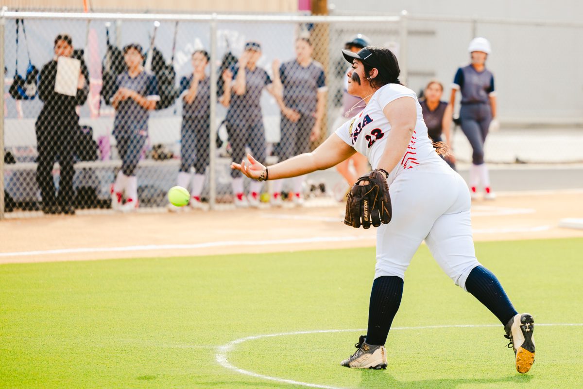 Starr Hernandez pitches a fastball to Public Safety Academy in Norton varsity softball's first ever game on Thursday, Feb. 27, 2025. (Photo credit: <a href=