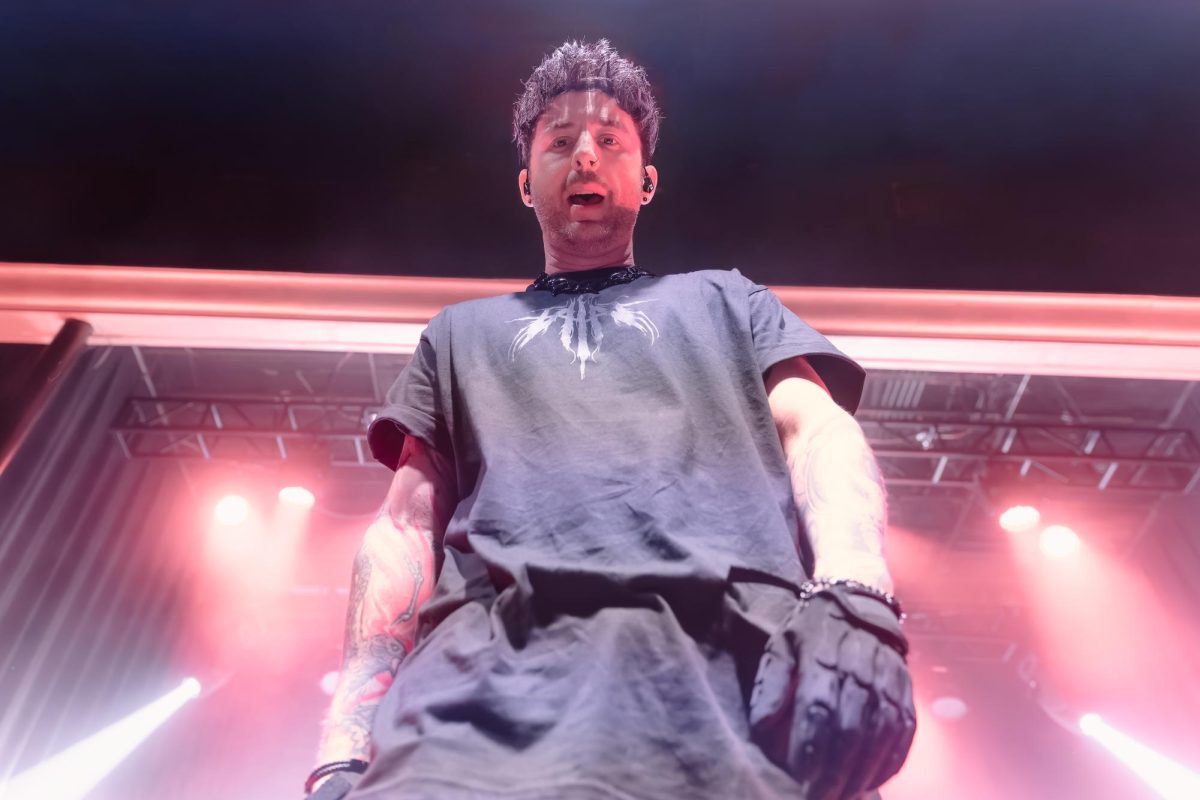 Vocalist Matt Brandyberry stares down into the photo pit as From Ashes to New takes the stage at Santa Ana's The Observatory on Sat. Sept. 27, 2025 for their New Disease Tour. (Photo credit: Ellis Evans)